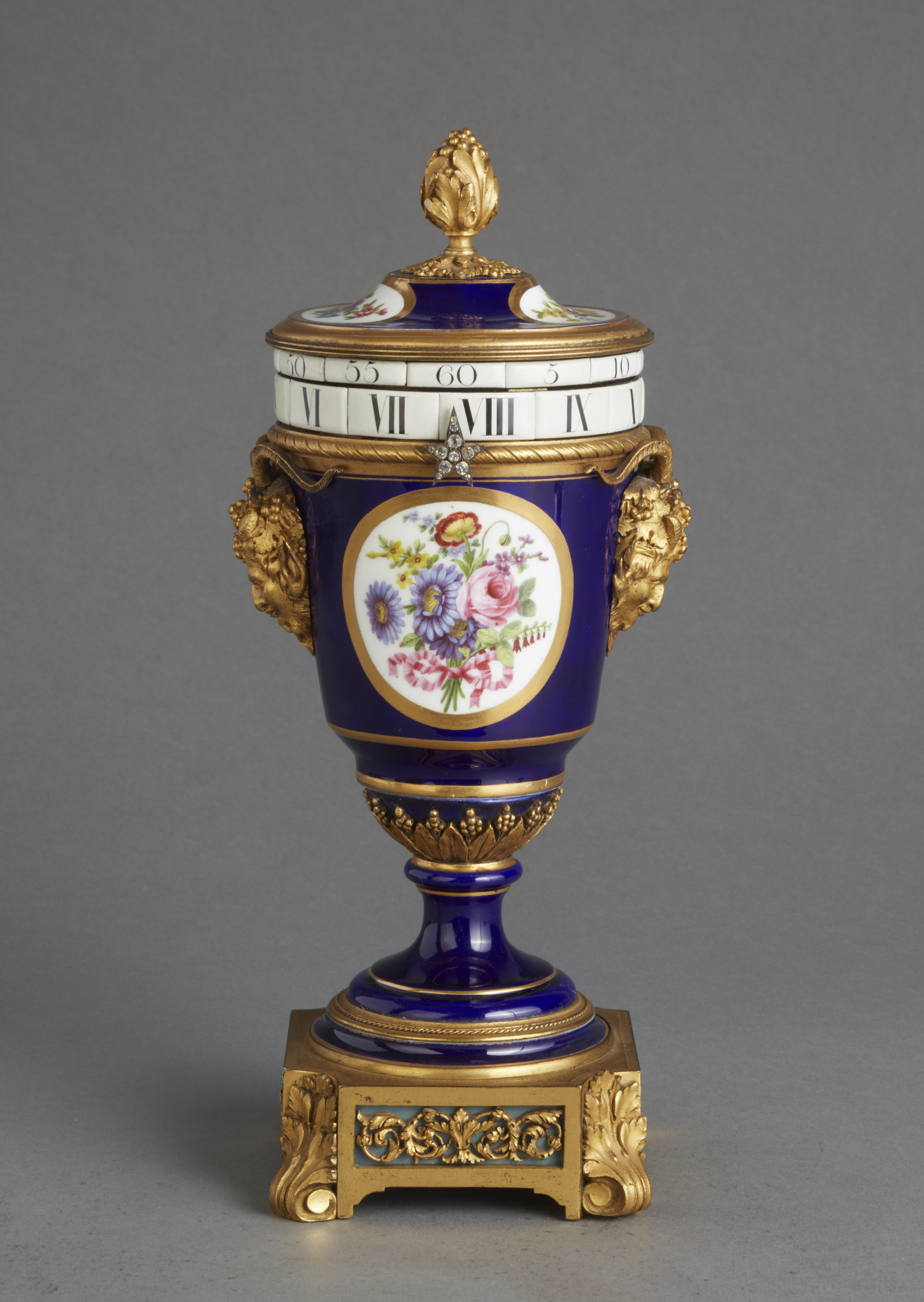 A good charming probably Sevres annular dial striking urn clock, circa 1880