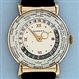 Fine and scarce Asassiz world time vintage 14K yellow gold wrist watch