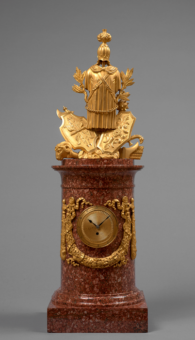 Important Gilt Bronze and Swedish Porphyry War Trophy Mantel Clock 
Sweden, Empire period, first third of the 19th century, circa 1815-1820
Height 56 cm; base 17.5 cm x 17.5 cm