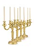 An extremely fine set of four Louis XVI gilt bronze two-light candelabra attributed to a design by Jean-Charles Delafosse and inscribed in red with the Cleveland Museum of Art accession numbers 72.124-127