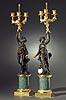 An important pair of Louis XVI gilt and patinated bronze and verde antico marble three-light figural candelabra after a model attributed to Joseph-Charles Marin