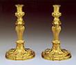 A pair of Louis XV gilt bronze candlesticks