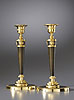 A very fine pair of Empire gilt and patinated bronze candlesticks attributed to Claude Galle