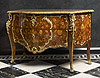 An important and very beautiful Louis XV gilt bronze mounted amaranth, bois satiné floral marquetry bombé commode by Pierre Fléchy, stamped P FLECHY and also stamped with the monogram of the jurés JME