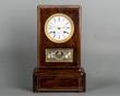 The unusual kingwood mantel clock with calendar work and moon fase, circa 1840