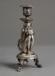 An unusual Silvered candle stick of an old man as fantasy figure, circa 1880