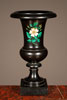 A decorative black marble urn with malachite inlay, circa 1880.