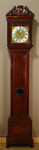 An important early Dutch walnut veneered and carved longcase clock,by Huijgens Amsterdam, circa 1690.