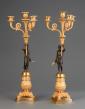 A good pair of four light empire candle sticks, circa 1820