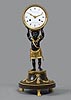 A very fine and rare Empire gilt and patinated bronze pendule au jeune nègre of eight day duration by Deverberie et Compagnie, signed on the white enamel dial Jnt. F.et Deverberie & C.nie Rue Des Fosses Du Temple, No. 47 à Paris