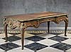 A very fine Louis XV style gilt bronze mounted mahogany bureau plat attributed to Alfred Beurdeley after a model by Charles Cressent