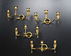 A very fine set of four Empire gilt and patinated bronze three-light wall-lights attributed to André-Antoine Ravrio