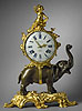 A rare and important Louis XV gilt and patinated bronze Pendule ‘À L’Éléphant’ with magnificent case by Jean-Joseph de Saint-Germain, signed on the base S. GERMAIN, also signed on the white enamel dial Gosselin à Paris