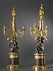 A magnificent pair of Louis XVI gilt and patinated bronze three-light candelabra attributed to François Rémond after a model by Etienne Falconet