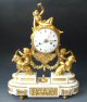 A French marble and gilt bronze sculptural mantle clock by Perret Jeanneret à Metz, Louis XVI period c. 1780.