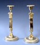 A pair exclusive Empire candlesticks, eagle-heads, circa 1810.
