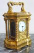 An small oval French carriage clock with Corinthian columns, circa 1880. 
