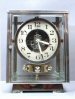 Nr. 60. Nickel Atmos clock, J. L. Reutter, skeleton dial , 5008, France ca. 1930. 
