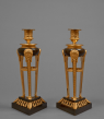 Rare Pair of Gilt and Patinated Bronze Candlesticks
Probably Italian, Empire period, circa 1810-1815
Height 28 cm; width of each side of the base 12.7 cm