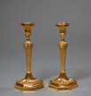 Rare Pair of Chased and Gilt Bronze Candlesticks 
Paris, Directoire period, circa 1795
Height 33 cm; width of the base 16 cm