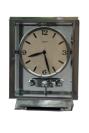 An early 1932 Rhodium plated art deco J. L. Reutter four-glass clock