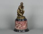 A lovely classic bronze figure on a kneeling Venus mounted on the beautiful marble base