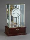 Untouched four glass electrical mantel clock from