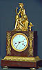 A French Empire ormolu and marble mantel clock, signed: