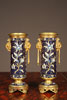 A pair of gilt-bronze and champleve enamel urns third quarter 19th century.
