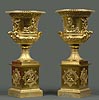 An extremely fine pair of Empire gilt bronze campana vases attributed to Claude Galle