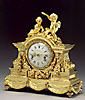 An important Louis XVI gilt bronze
mantle clock by Robin