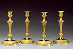 A fine set of 4 Louis XVI gilt bronze candlesticks