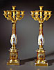 An imposing pair of Restauration gilt bronze and porcelain candelabra