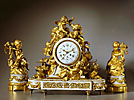 A fantastic gilt bronze clock set by Beurdely