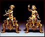 A pair of Régence gilt bronze chenets