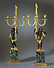 A fine pair of patinated and gilt bronze figural candelabra