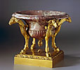 A very rare Louis XVI gilt bronze mounted marble coupe