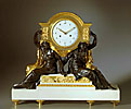 A very important Louis XVI gilt and patinated bronze and white marble mantle clock by ManiÃ¨re
