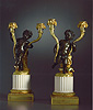 A very fine pair of Louis XVI gilt bronze and white marble candelabra