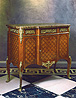 A very fine Louis XVI gilt bronze mounted commode