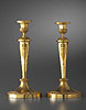An extremely fine pair of Empire candlesticks