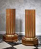 A fine pair of Empire period Russian gilt bronze mounted carved and gilded mahogany columns