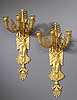 A superb pair of Empire gilt bronze three-light wall-lights attributed to Pierre-Philippe Thomire