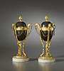 A fine pair of Empire gilt and patinated bronze cassolettes shaped as tripod athéniennes