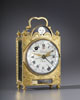 An extremely rare and very beautiful Louis XVI gilt bronze travelling clock of fourteen day duration