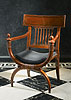 A very fine Directoire mahogany and inlaid ebony fauteuil attributed to Georges Jacob after a design by Charles Percier