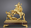 A fine Empire gilt bronze and rouge griotte marble statuette portraying an Amazonomachy scene portraying a beautiful female Amazon