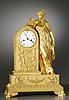 An extremely beautiful Empire gilt bronze mantle clock of eight day duration, signed on the white enamel dial Galle Rue Vivienne à Parria