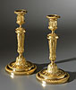 A very fine pair of Louis XVI gilt bronze candlesticks