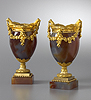 A very fine pair of Louis XVI style gilt bronze mounted agate vases